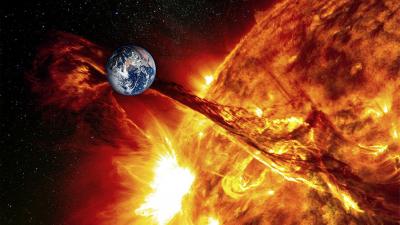 pПланета Земля на фоне Солнца, концепция солнечной активности, геомагнитная буря. Фото © Shutterstock/p
